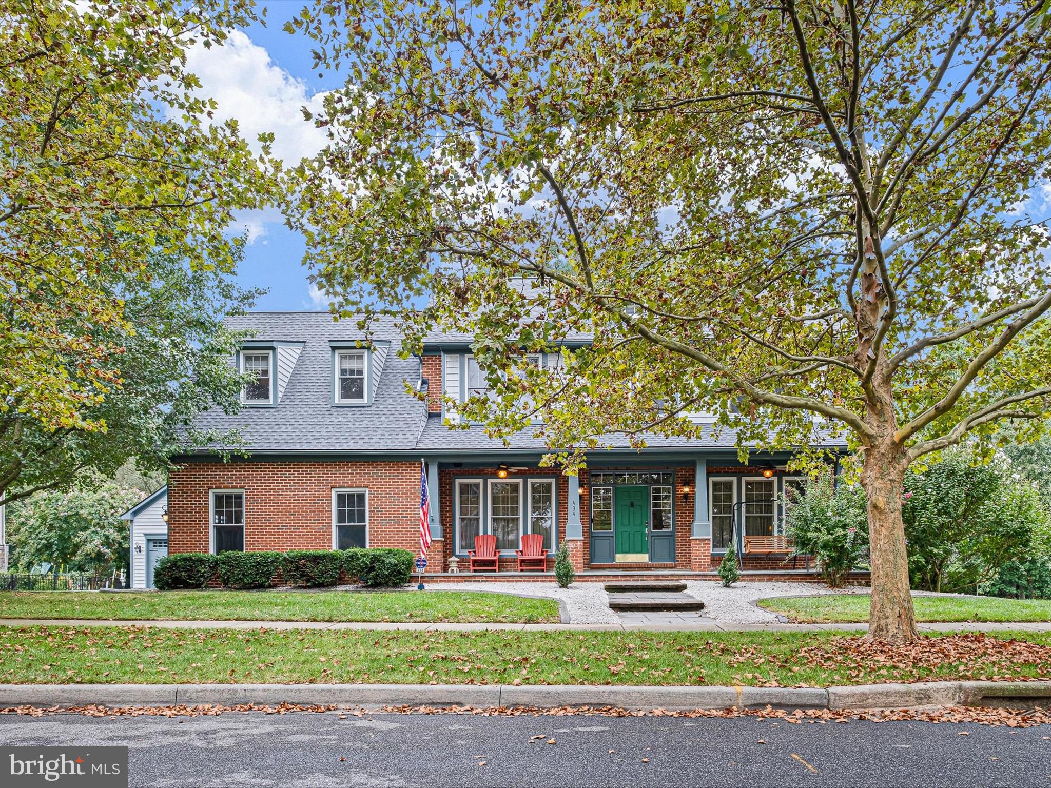 434 Spring Hollow Drive Middletown, DE 19709 - Photo 58 of 59 a front view of a house with a garden and trees