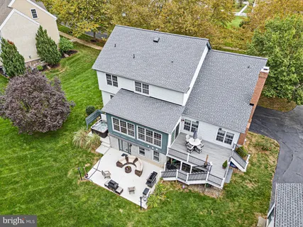aerial view of a house with garden