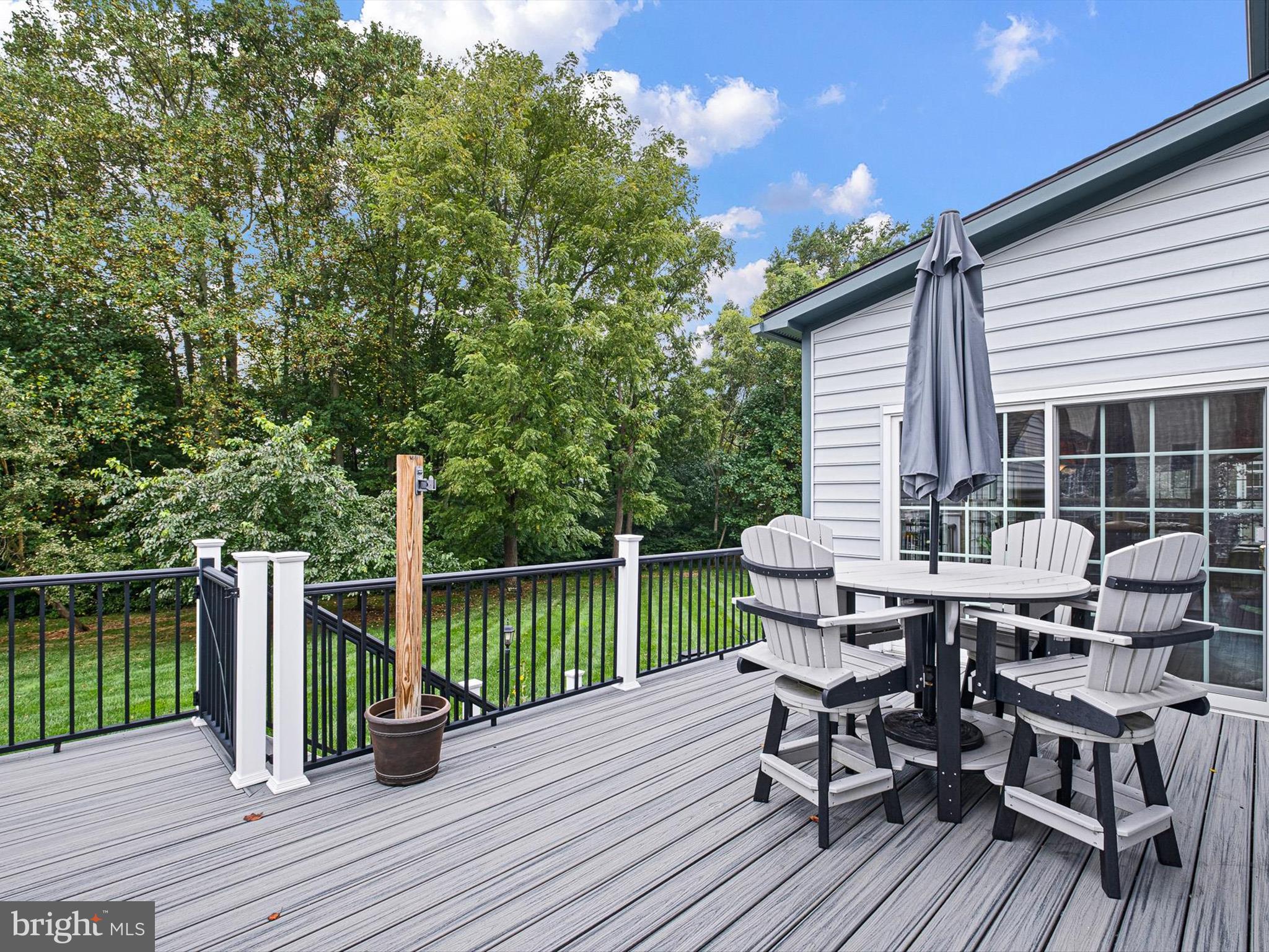434 Spring Hollow Drive Middletown, DE 19709 - Photo 8 of 59 a view of a deck with furniture and wooden deck
