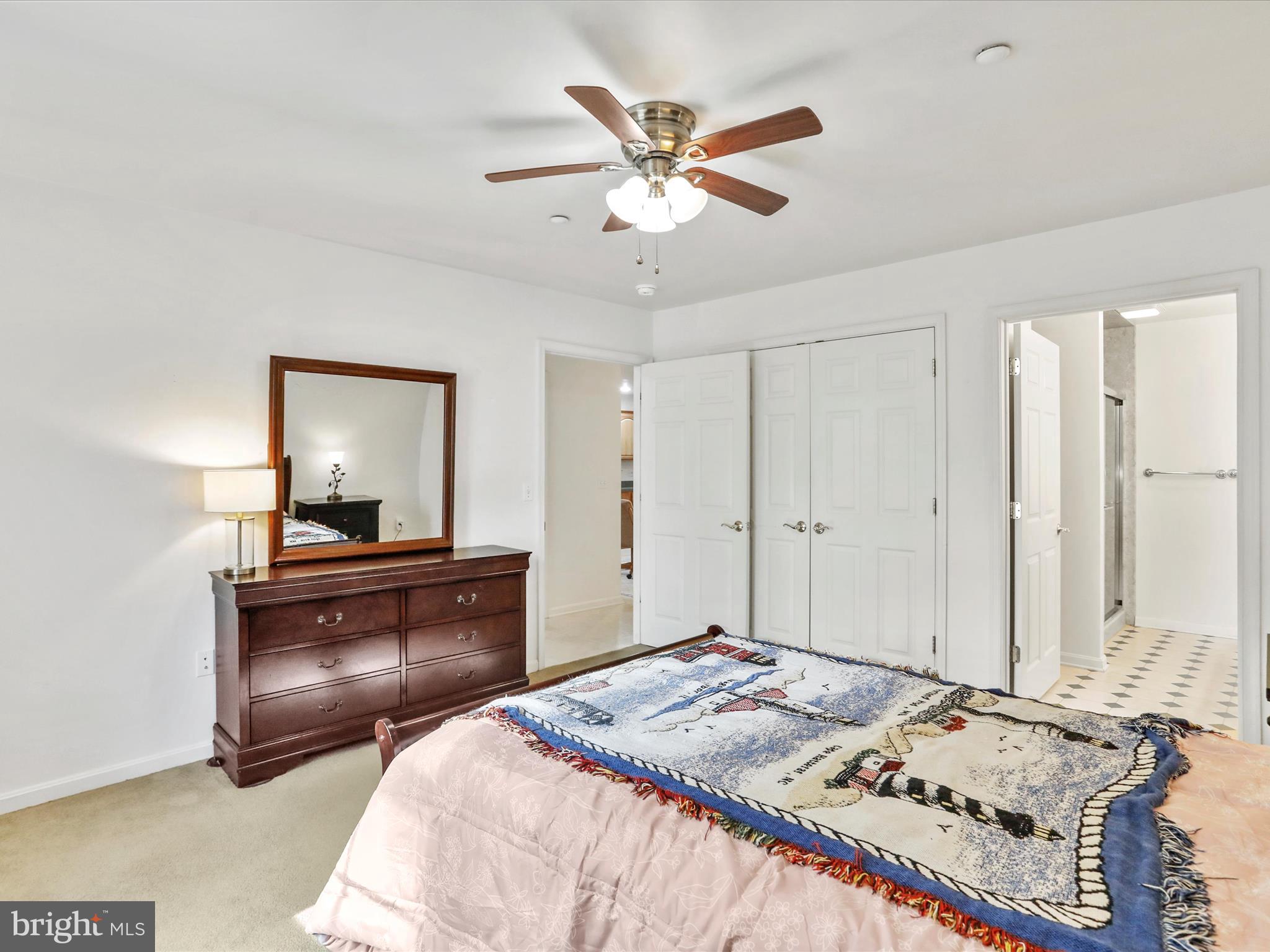 324 Key W Drive Hagerstown, MD 21740 - Photo 13 of 28 a bedroom with a bed and a chandelier