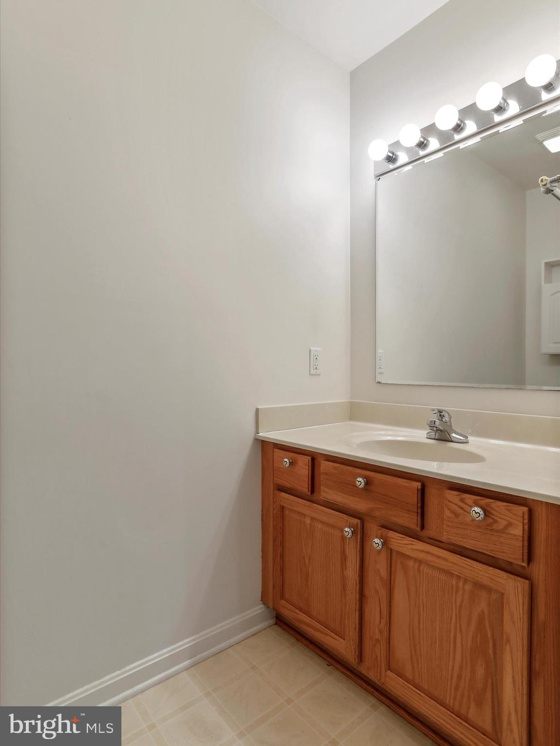 324 Key W Drive Hagerstown, MD 21740 - Photo 16 of 28 a bathroom with a sink and a mirror