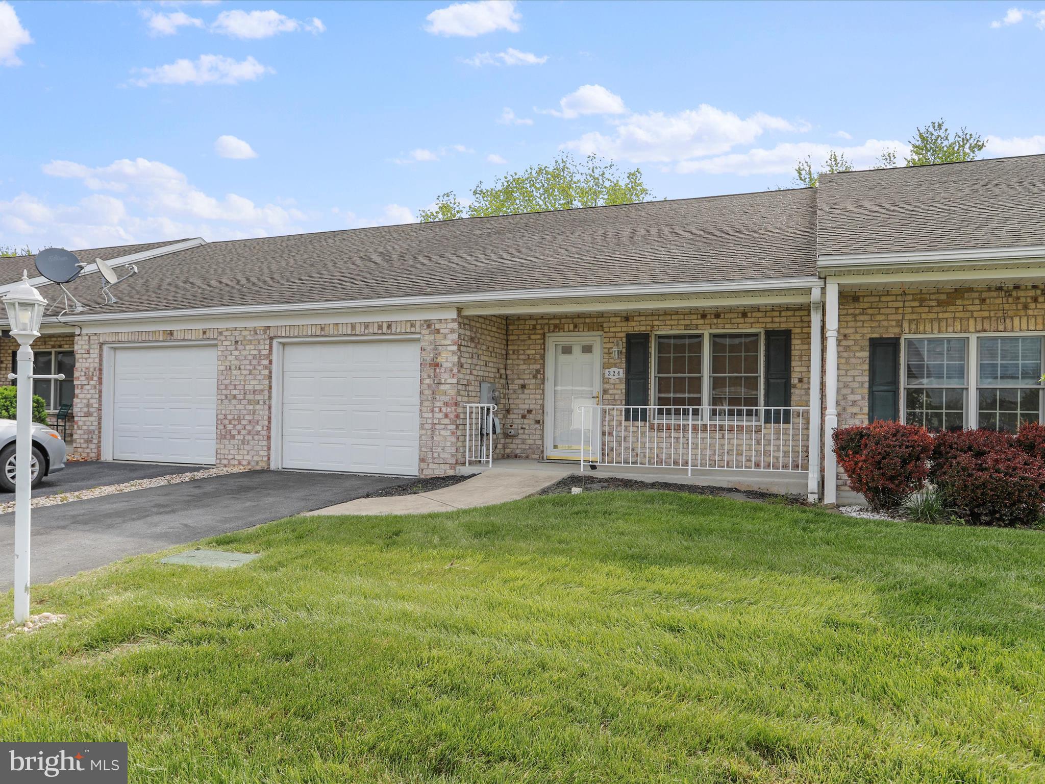 324 Key W Drive Hagerstown, MD 21740 - Photo 26 of 28 a view of a backyard with a garden and plants