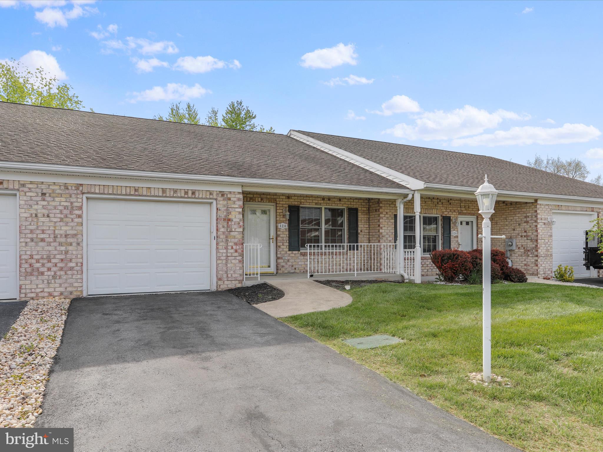 324 Key W Drive Hagerstown, MD 21740 - Photo 27 of 28 front view of a house with a yard and porch