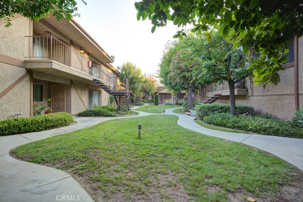 313 South Almansor Street, Unit 2 Alhambra, CA 91801 - Photo 38 of 39 a view of a house with a yard