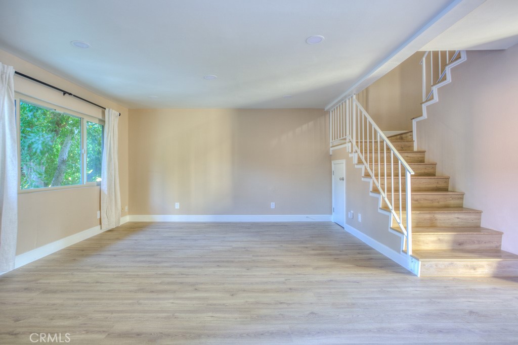 313 South Almansor Street, Unit 2 Alhambra, CA 91801 - Photo 8 of 39 a view of an entryway with wooden floor