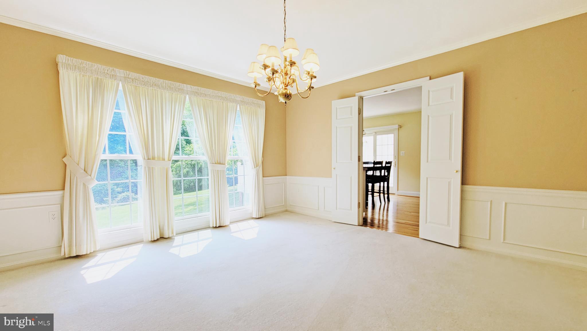 8219 Riding Ridge Place McLean, VA 22102 - Photo 22 of 79 DINING ROOM HAS HARDWOOD UNDER THE CARPET