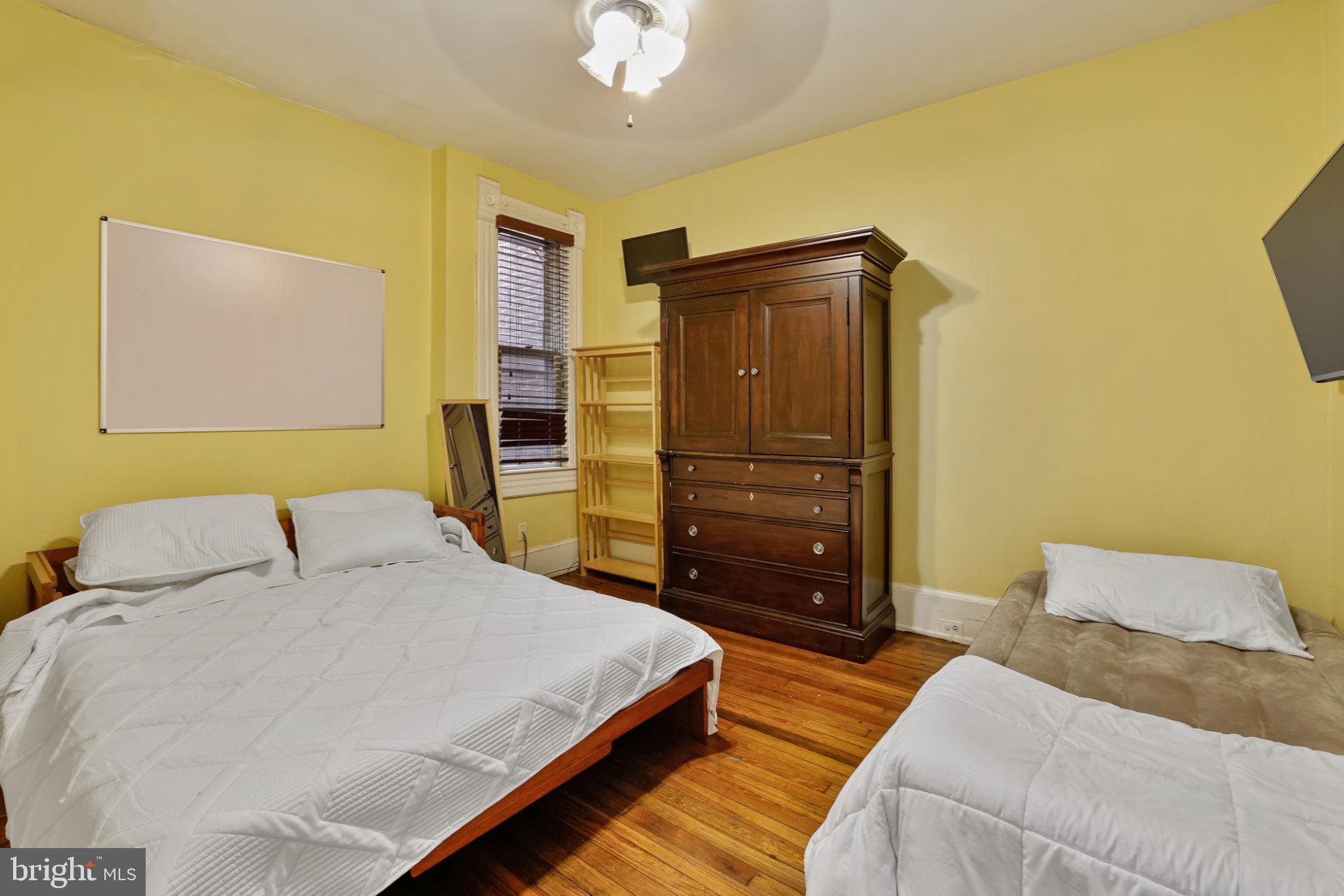 430 New Jersey Avenue Southeast Washington, DC 20003 - Photo 25 of 34 Bright and inviting bedroom with warm tones.