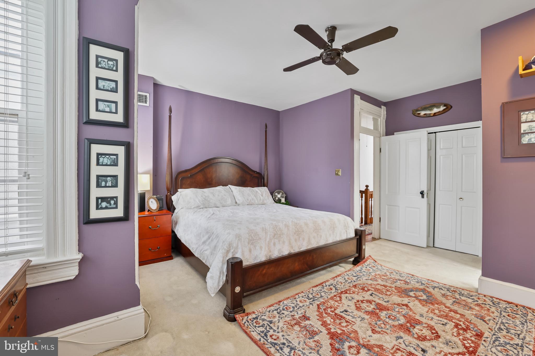 430 New Jersey Avenue Southeast Washington, DC 20003 - Photo 29 of 34 Charming bedroom with rich purple hues.