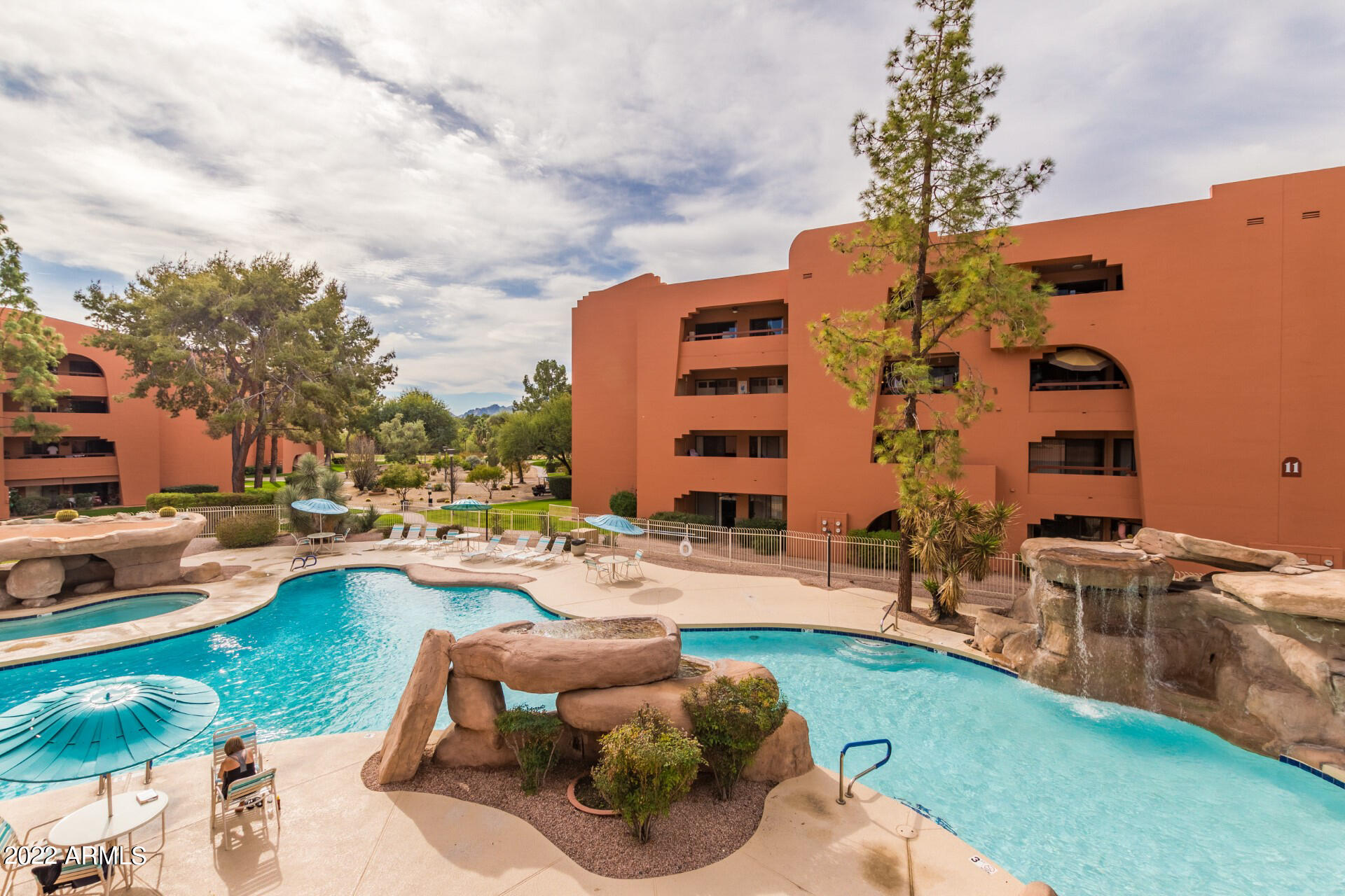 4303 East Cactus Road, Unit 134 Phoenix, AZ 85032 - Photo 24 of 48 Clubhouse Pool Just Steps From Condo