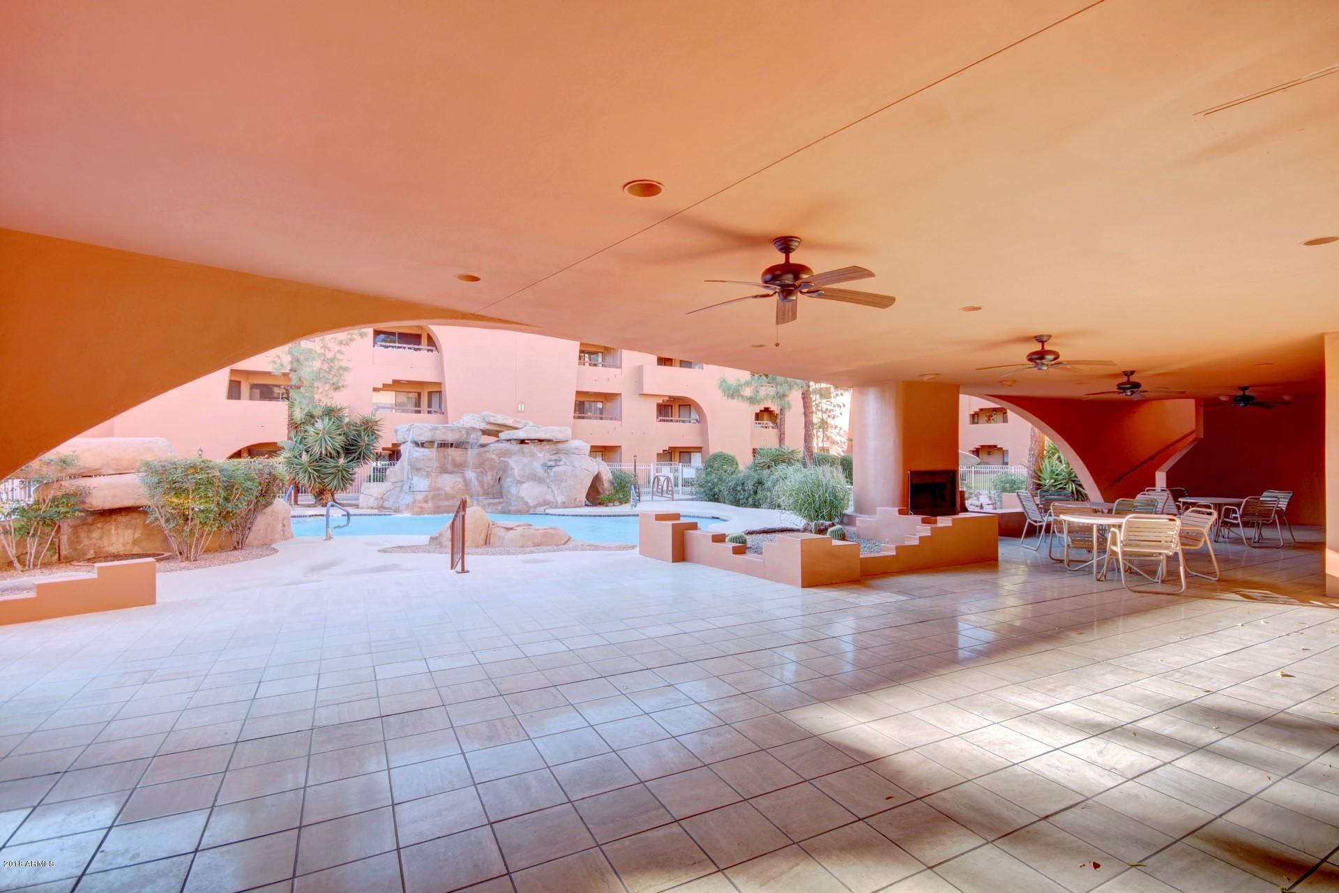 4303 East Cactus Road, Unit 134 Phoenix, AZ 85032 - Photo 45 of 48 Clubhouse Patio