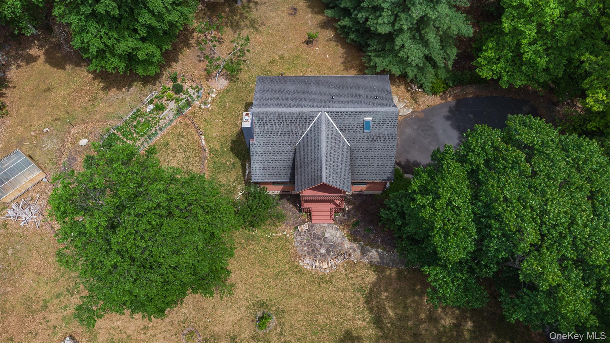 182 Frey Road Pine Bush, NY 12566 - Photo 32 of 33 an aerial view of a house with a yard and trees all around