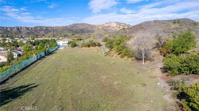 a view of a lake with mountains in the background