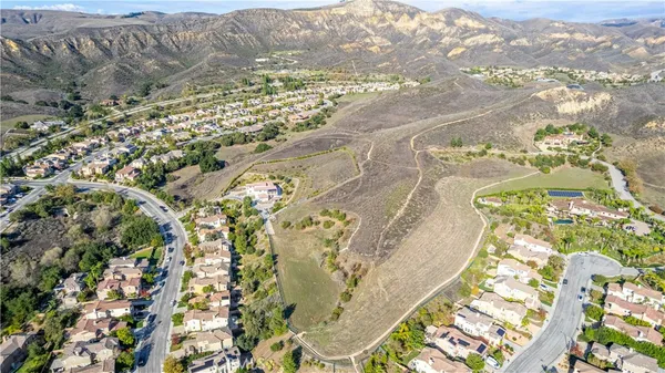 a view of yard with swimming pool