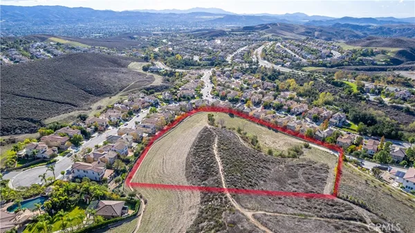 a view of a city with mountain