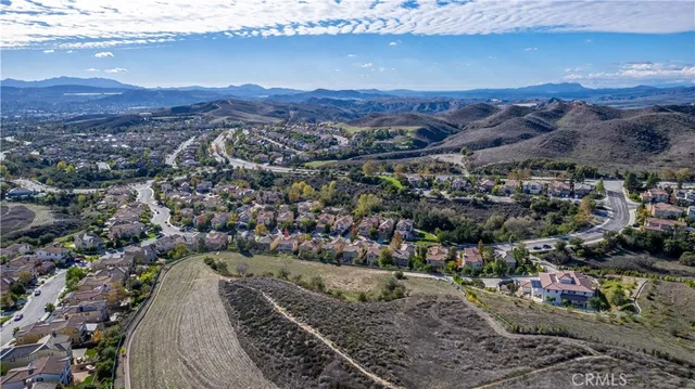a view of a city street from a balcony