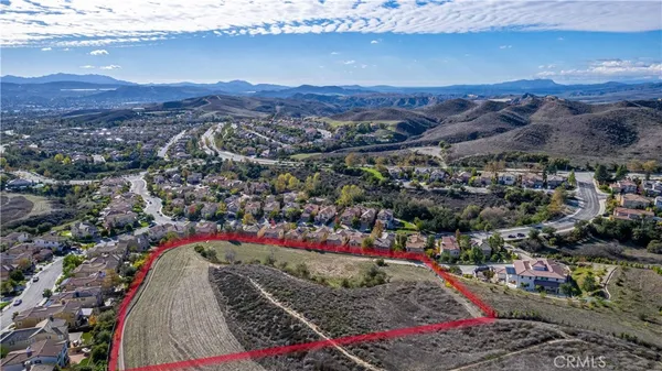 a view of a yard from a balcony