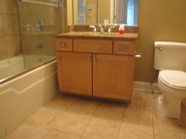 1001 West Madison Street, Unit 501 Chicago, IL 60607 - Photo 11 of 15 a bathroom with a sink a toilet and tub