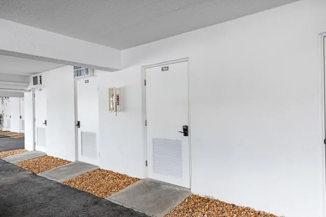 a bathroom with a shower and a toilet