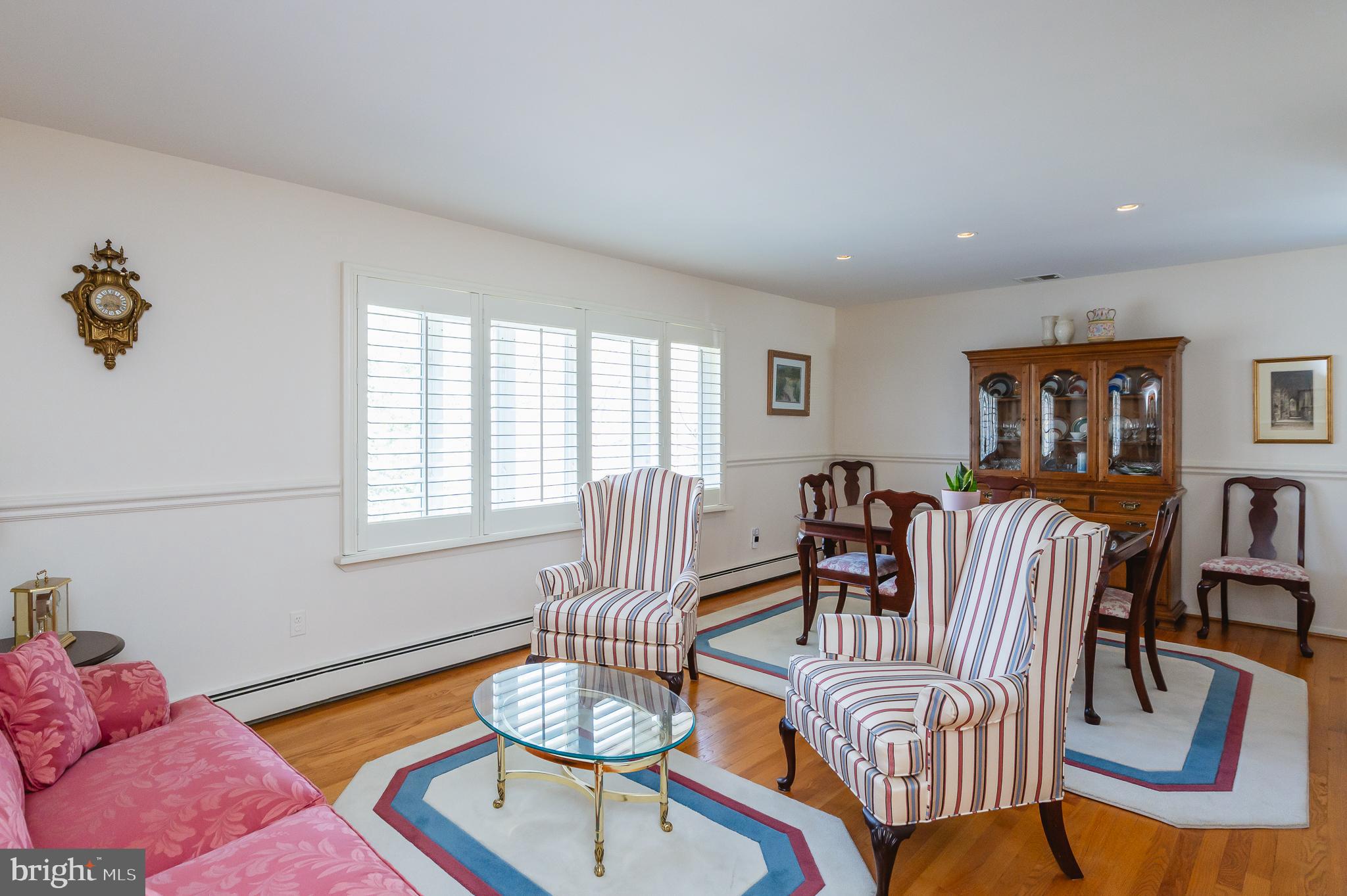 8337 Analee Avenue Rosedale, MD 21237 - Photo 5 of 48 a dining room with furniture a rug and wooden floor