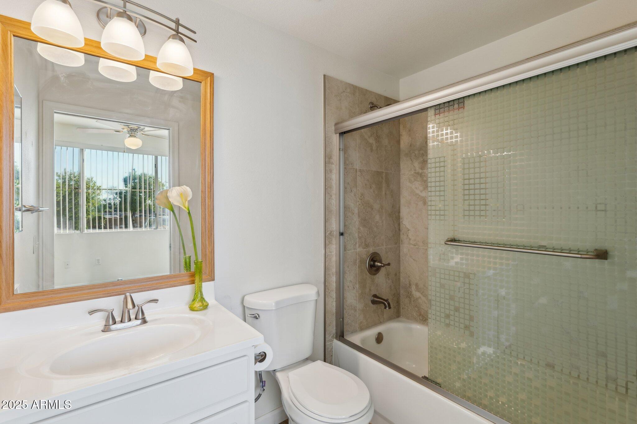 1701 East Colter Street, Unit 182 Phoenix, AZ 85016 - Photo 20 of 55 a bathroom with a sink toilet and shower
