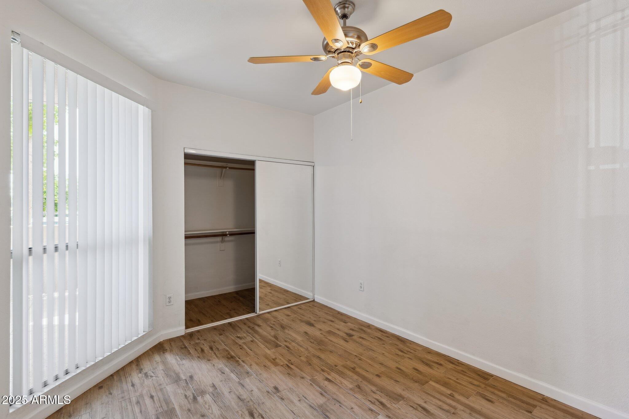 1701 East Colter Street, Unit 182 Phoenix, AZ 85016 - Photo 21 of 55 a view of an empty room with a window