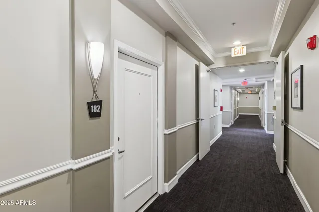 a view of hallway with walk in closet