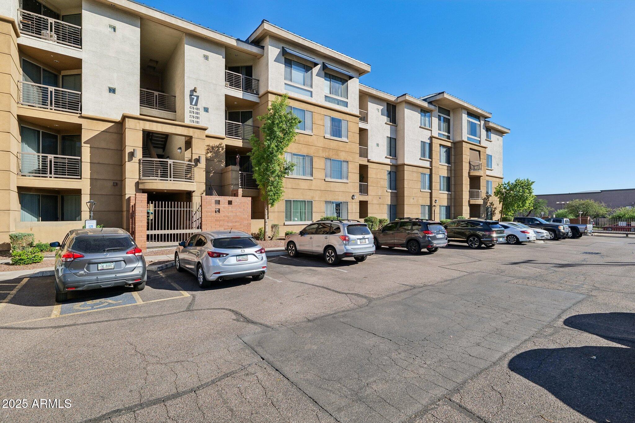 1701 East Colter Street, Unit 182 Phoenix, AZ 85016 - Photo 29 of 55 a couple of cars parked in front of a building