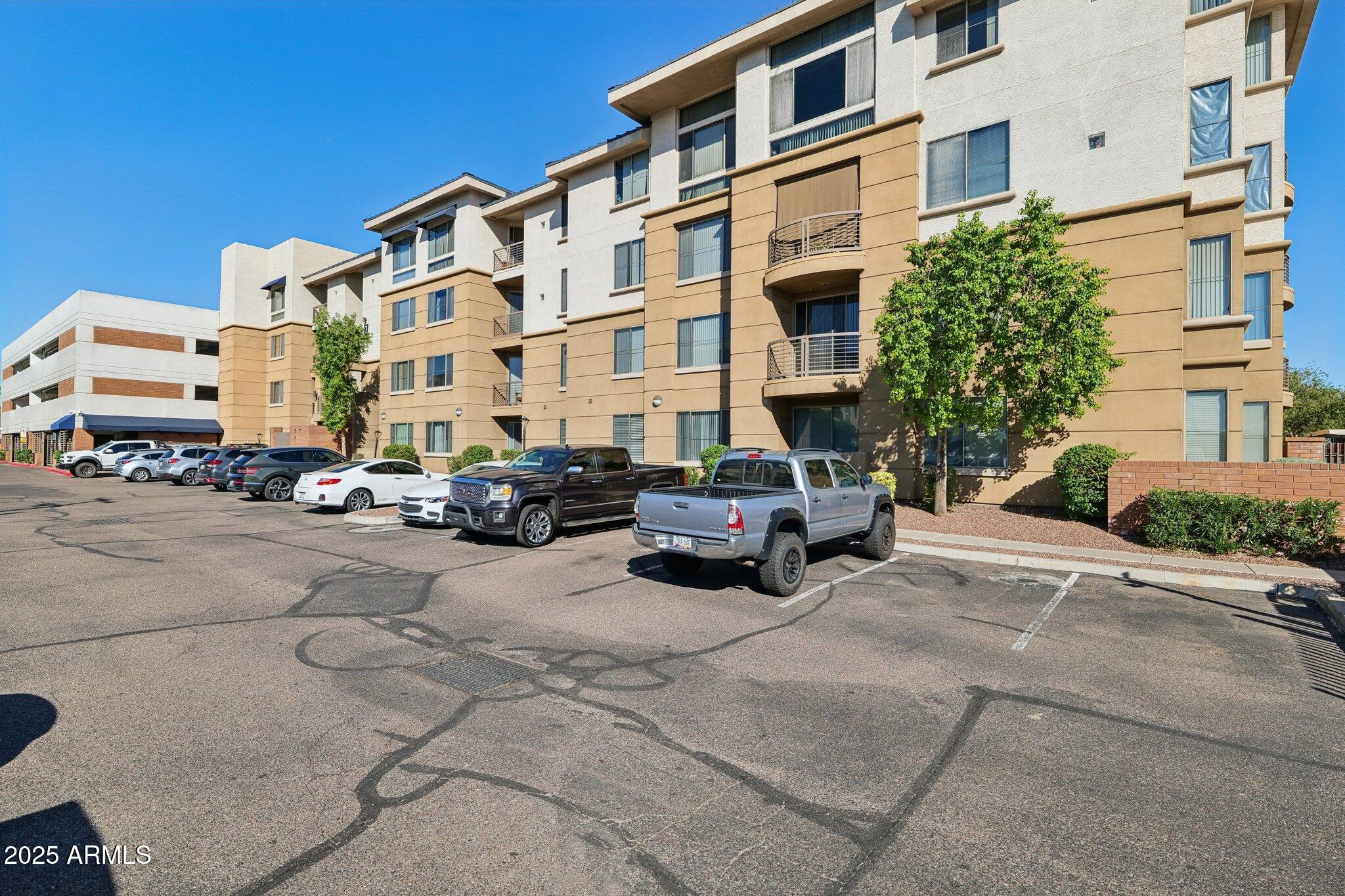 1701 East Colter Street, Unit 182 Phoenix, AZ 85016 - Photo 30 of 55 a parked cars parked in front of a building