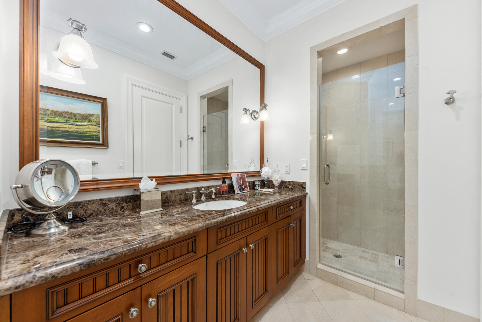 503 Bald Eagle Drive Jupiter, FL 33477 - Photo 20 of 62 a bathroom with a granite countertop sink mirror and shower