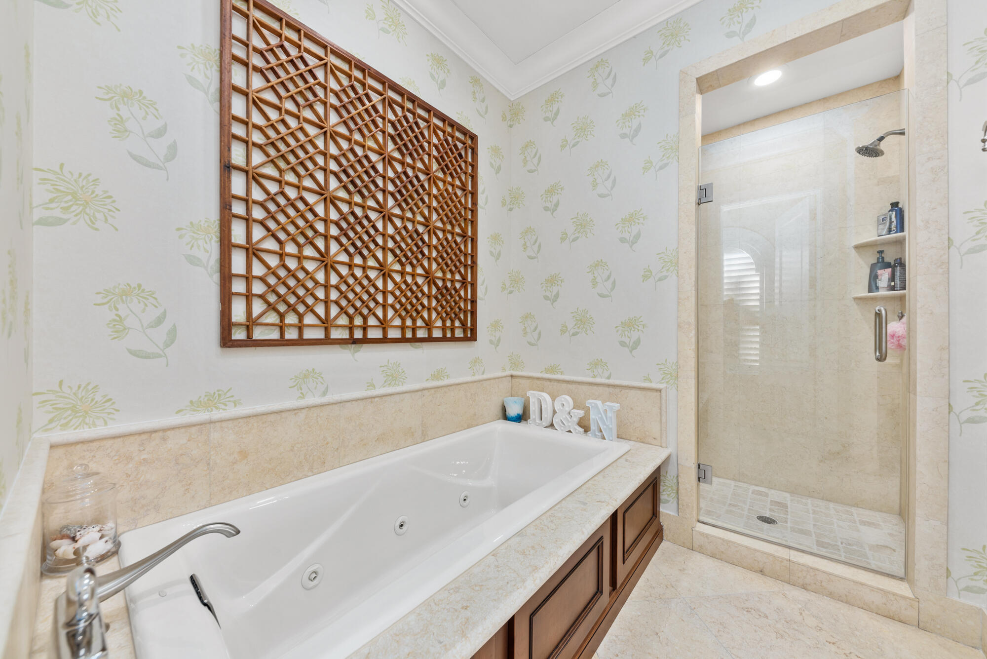 503 Bald Eagle Drive Jupiter, FL 33477 - Photo 24 of 62 a bathroom with a tub and a shower
