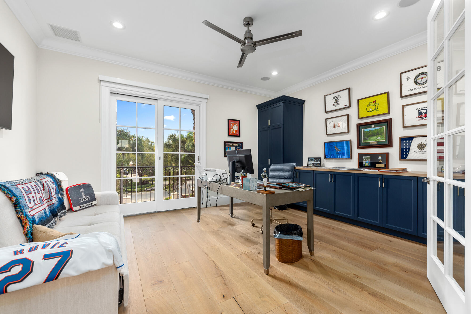 503 Bald Eagle Drive Jupiter, FL 33477 - Photo 25 of 62 a work room with furniture wooden floor and window