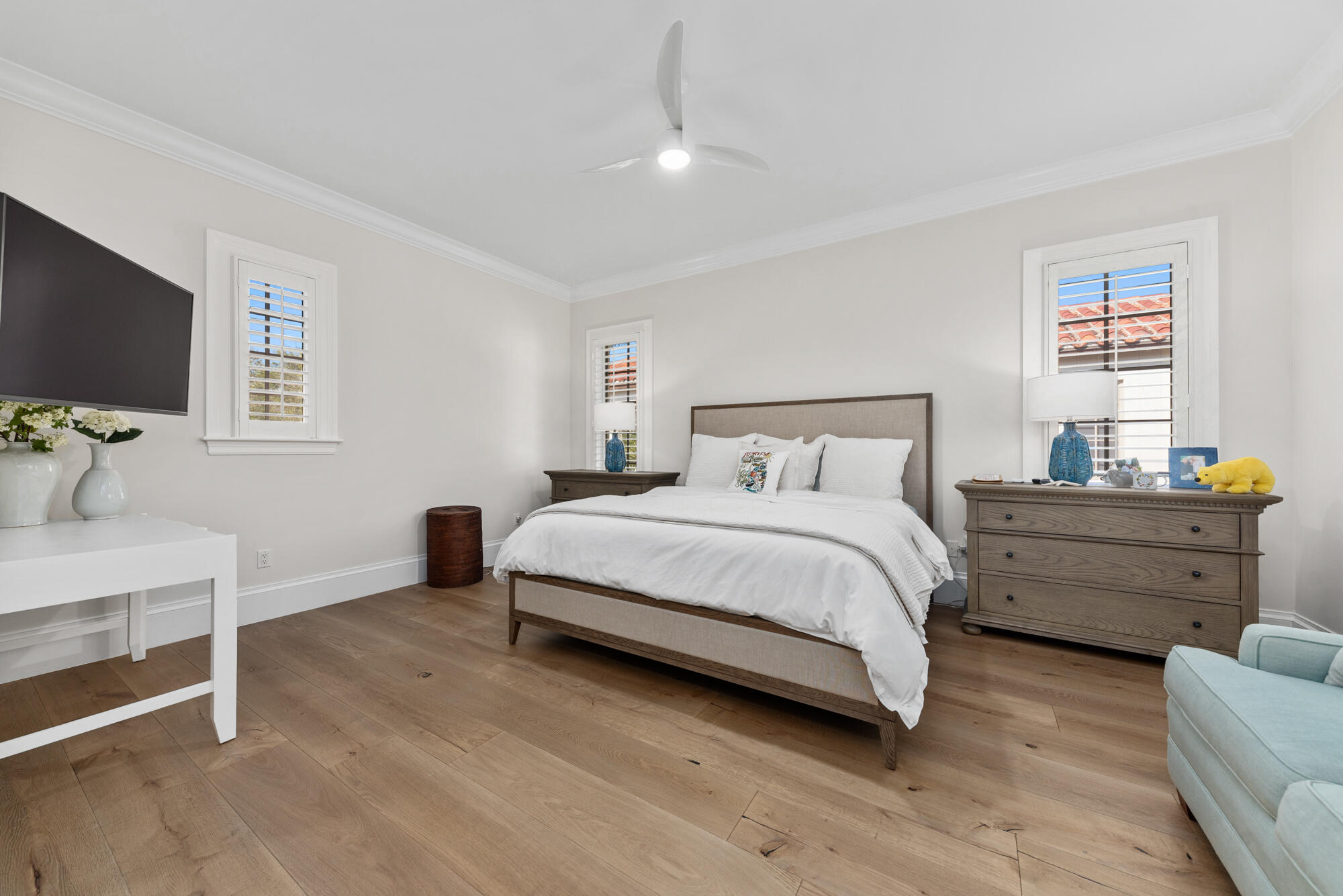 503 Bald Eagle Drive Jupiter, FL 33477 - Photo 26 of 62 a bedroom with a bed and a flat screen tv