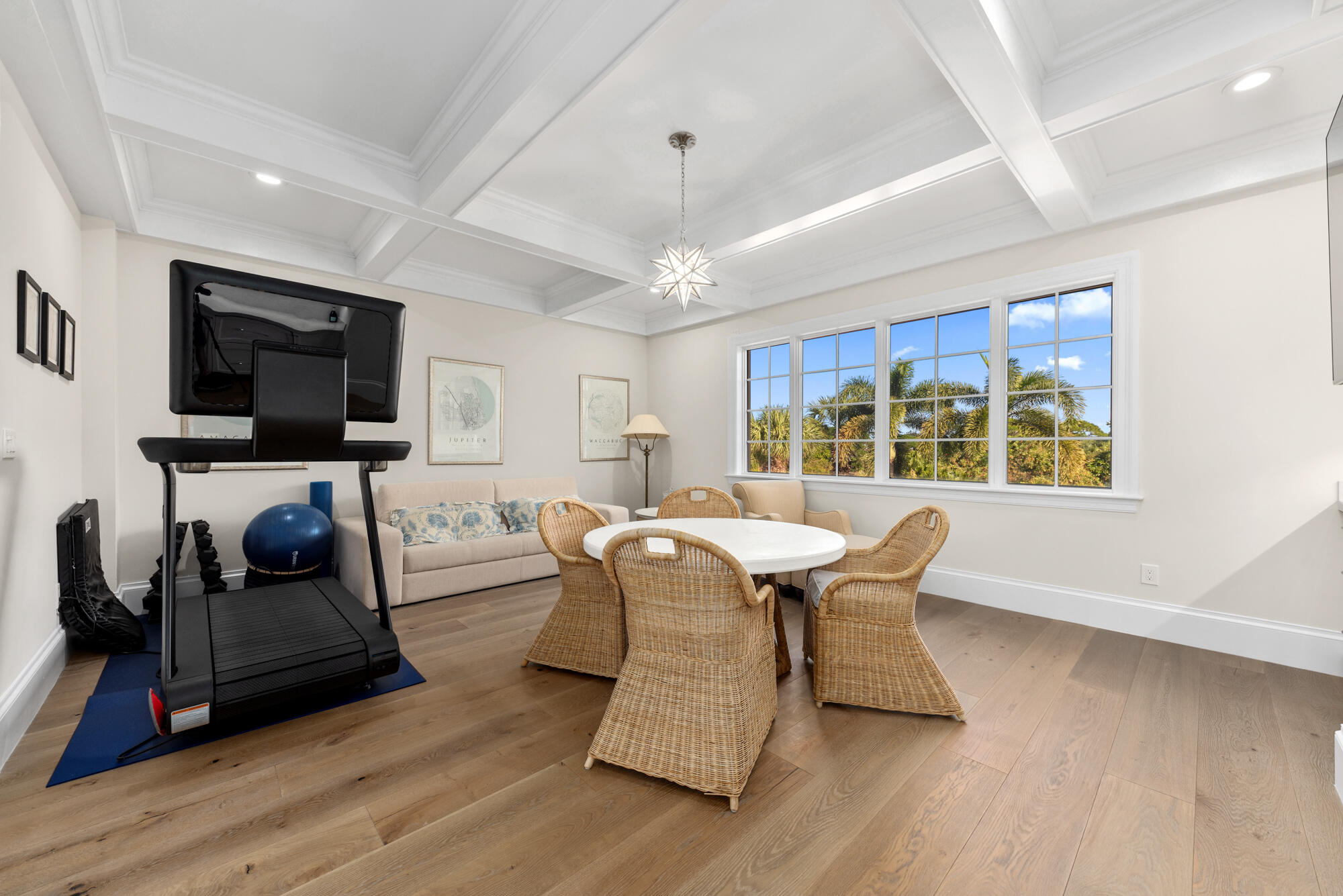 503 Bald Eagle Drive Jupiter, FL 33477 - Photo 28 of 62 a living room with furniture a flat screen tv and large window