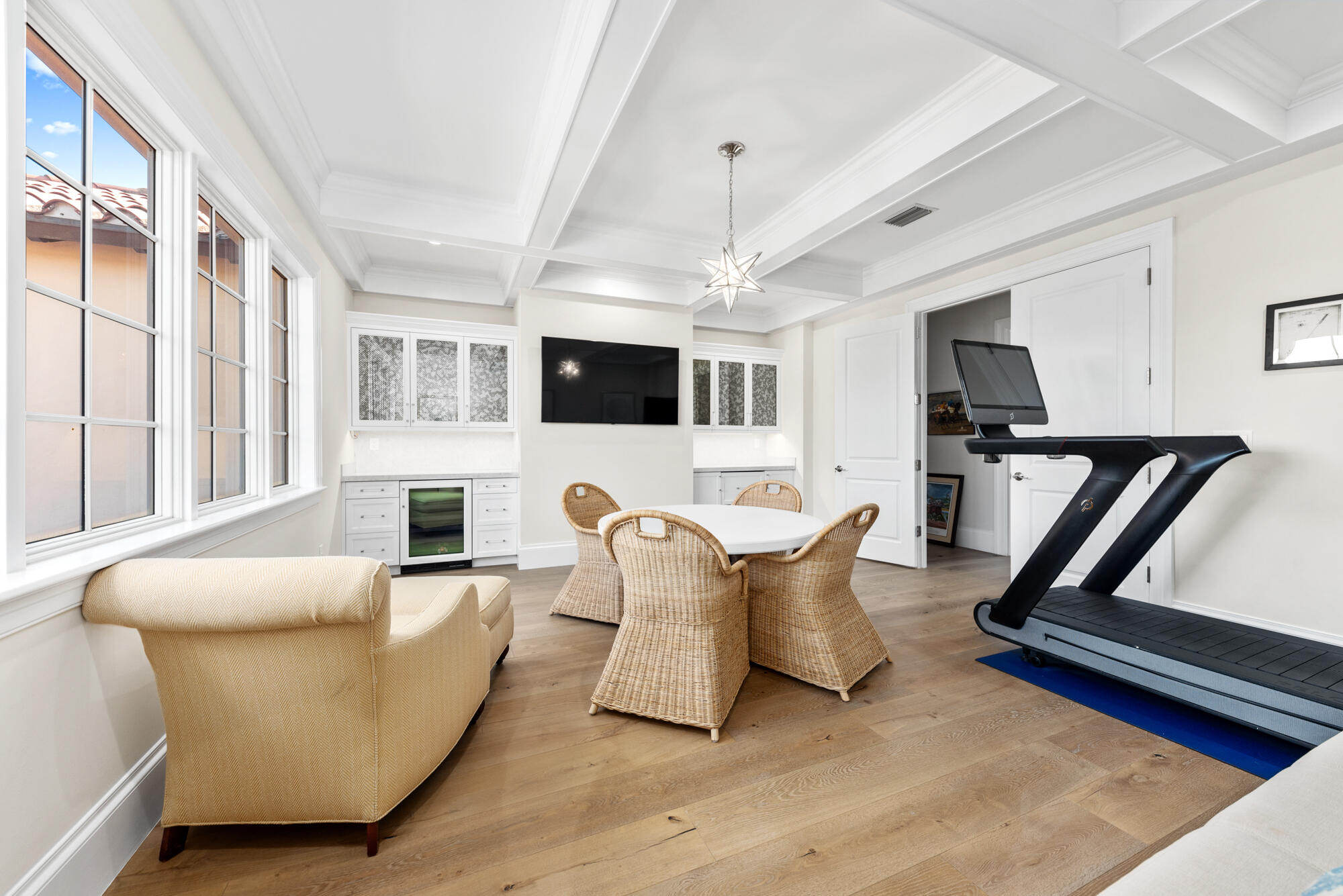503 Bald Eagle Drive Jupiter, FL 33477 - Photo 29 of 62 a living room with furniture and a flat screen tv