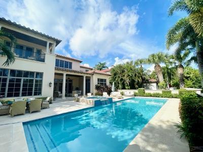 503 Bald Eagle Drive Jupiter, FL 33477 - Photo 33 of 62 a view of a house with a swimming pool and sitting area