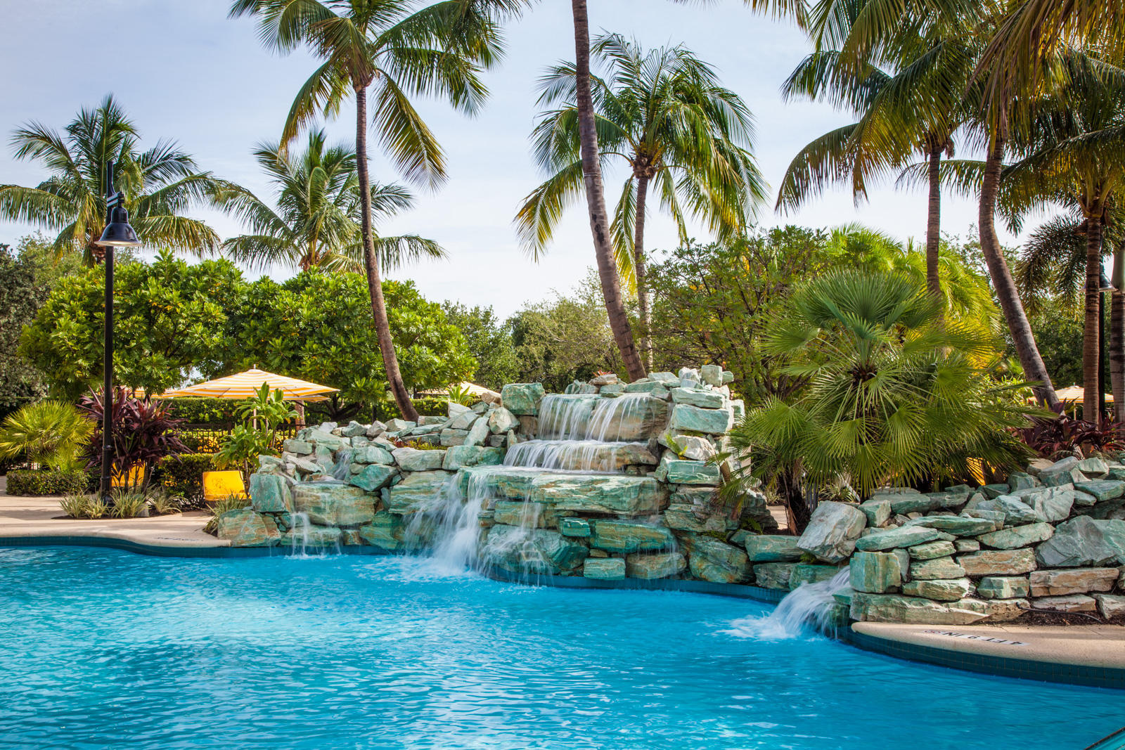 503 Bald Eagle Drive Jupiter, FL 33477 - Photo 38 of 62 a view of a house with swimming pool and sitting area