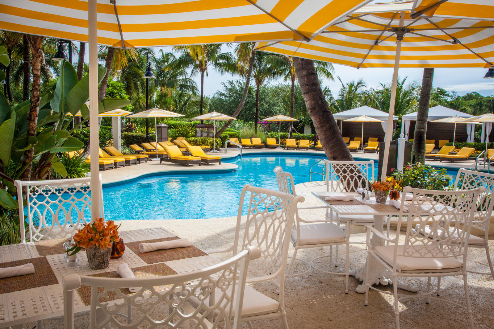 503 Bald Eagle Drive Jupiter, FL 33477 - Photo 41 of 62 a view of an outdoor sitting area with furniture and garden