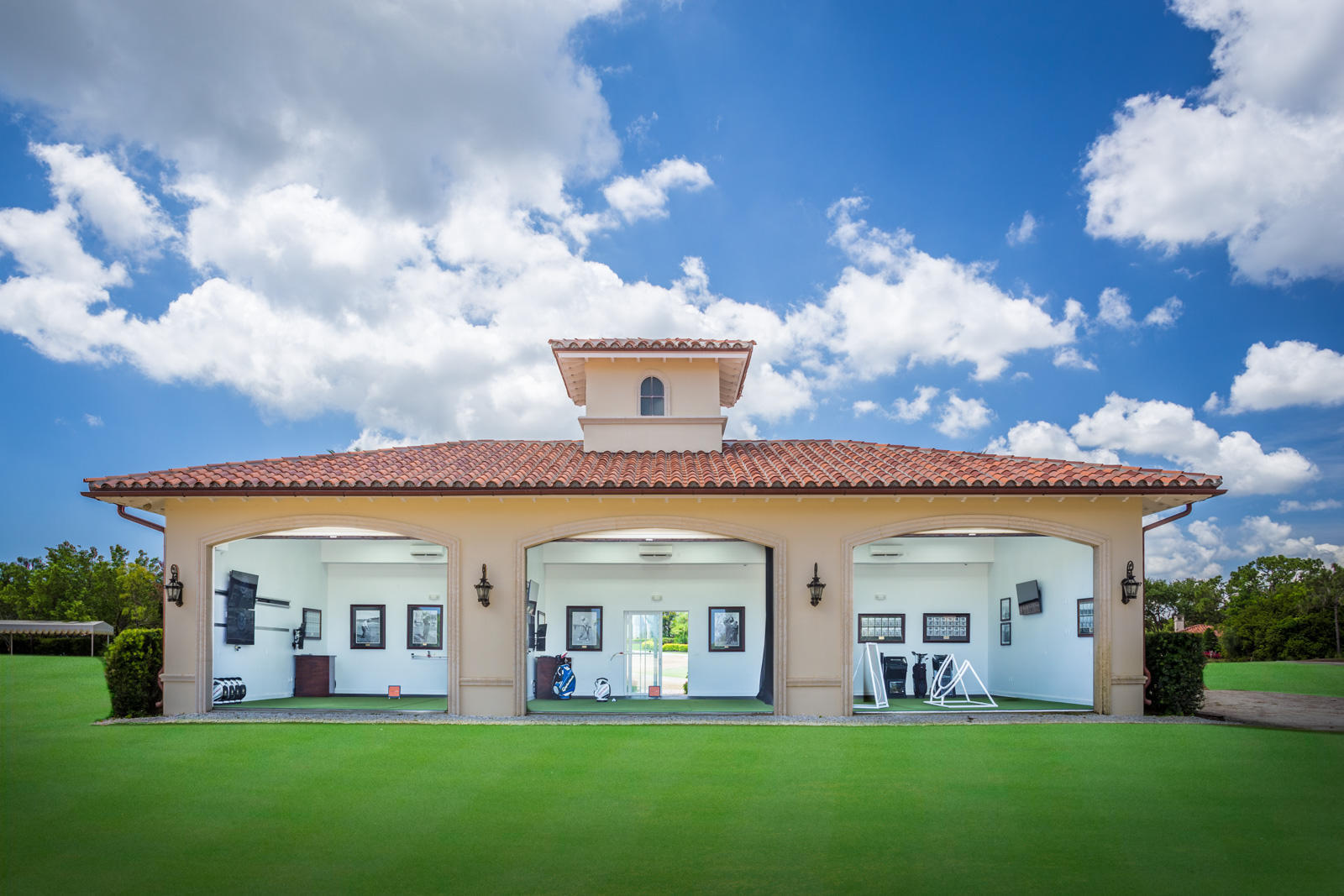 503 Bald Eagle Drive Jupiter, FL 33477 - Photo 45 of 62 a front view of a house with a garden and plants
