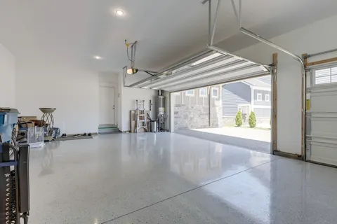 a view of an empty room and a window