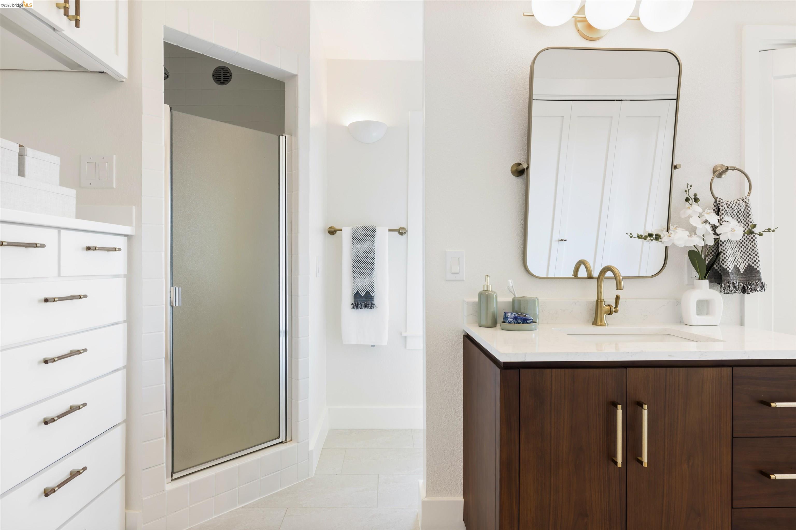 900 Euclid Avenue Berkeley, CA 94708 - Photo 24 of 54 a bathroom with a double vanity sink and a mirror