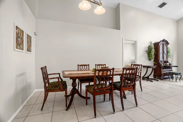 a view of a dining room with furniture