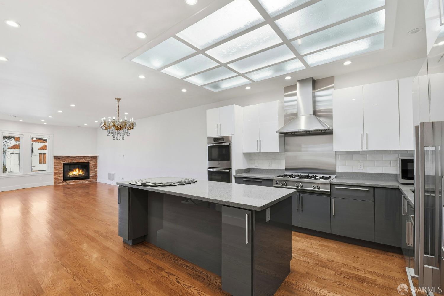 526 Silver Avenue San Francisco, CA 94112 - Photo 15 of 44 a kitchen with stainless steel appliances granite countertop a sink stove and refrigerator