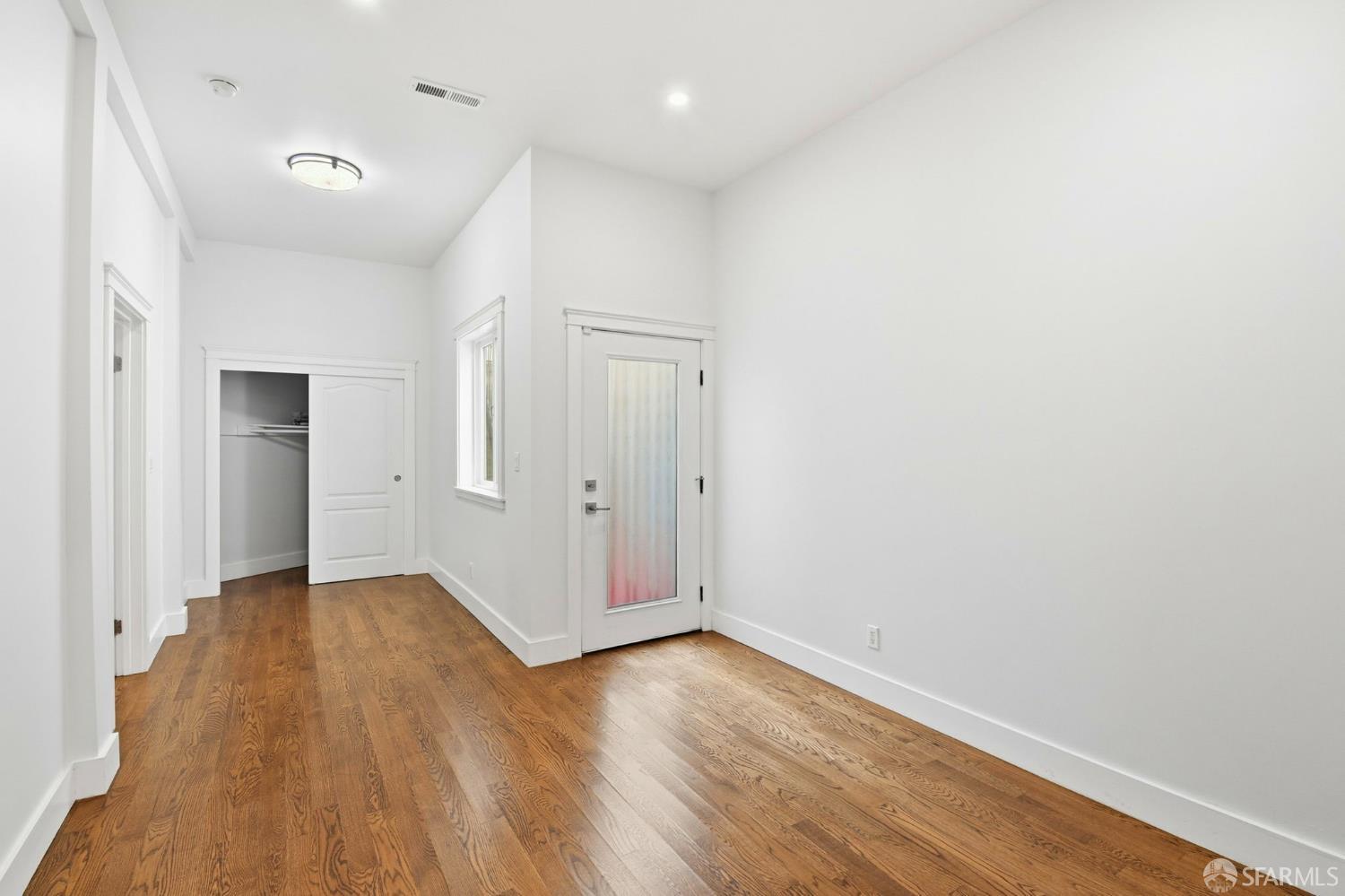 526 Silver Avenue San Francisco, CA 94112 - Photo 20 of 44 wooden floor in an empty room