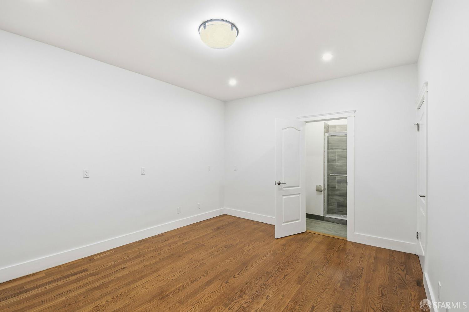526 Silver Avenue San Francisco, CA 94112 - Photo 24 of 44 wooden floor in an empty room