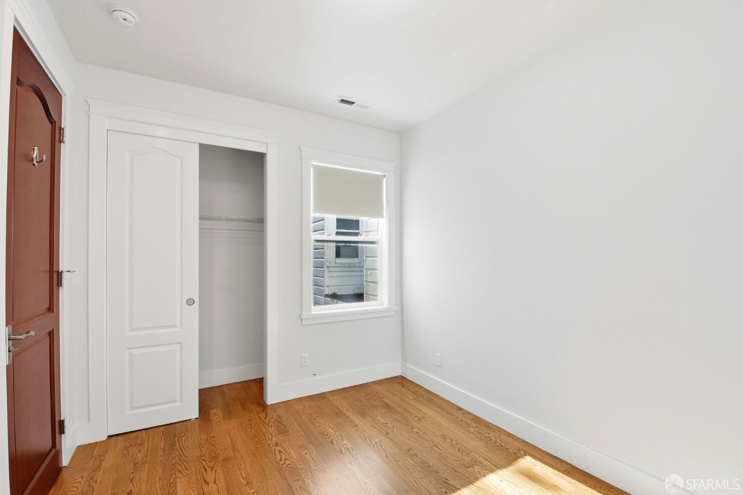 526 Silver Avenue San Francisco, CA 94112 - Photo 28 of 44 an empty room with windows