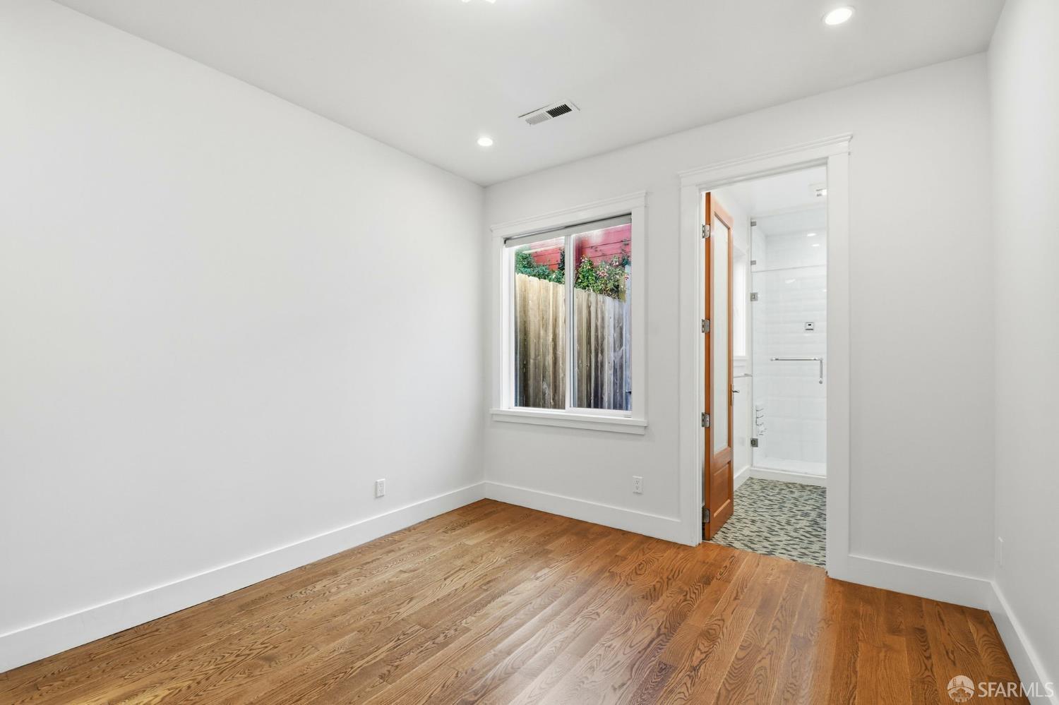 526 Silver Avenue San Francisco, CA 94112 - Photo 30 of 44 wooden floor in an empty room