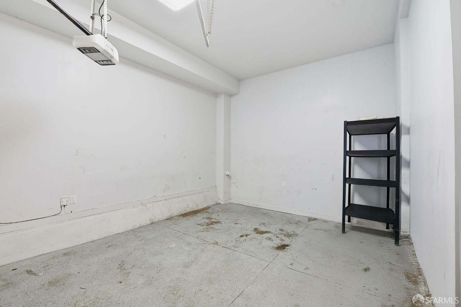 526 Silver Avenue San Francisco, CA 94112 - Photo 38 of 44 a view of a room with rack on the wall