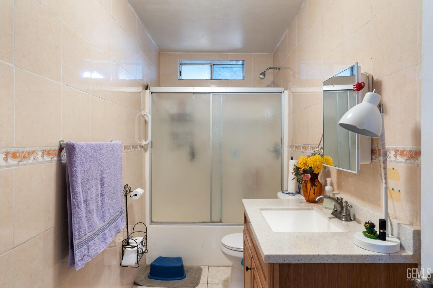 Undisclosed Address Arvin, CA 93203 - Photo 10 of 19 a bathroom with a sink and a mirror