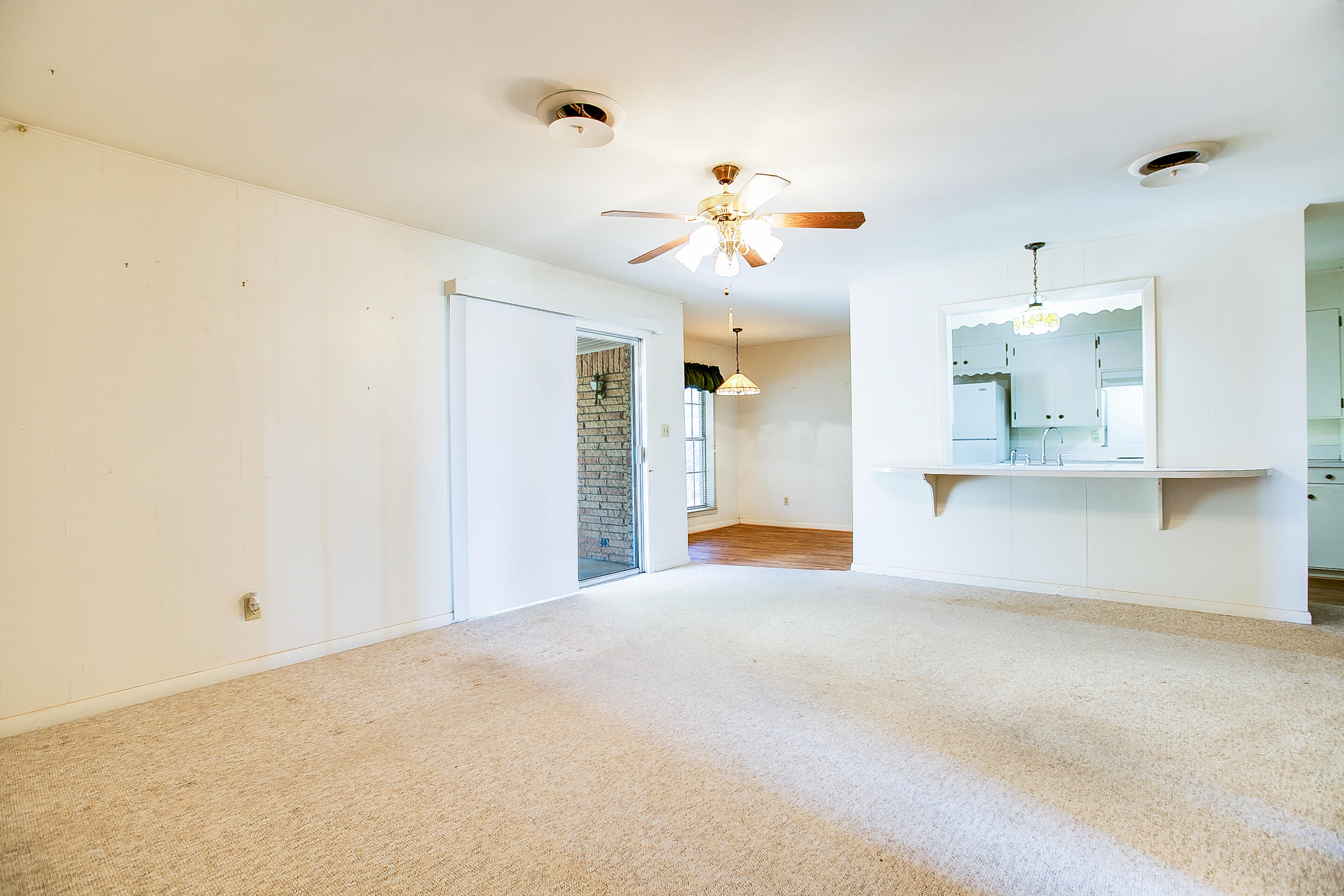 702 South State Street Bronte, TX 76933 - Photo 12 of 41 Pass thru from kitchen into the living area