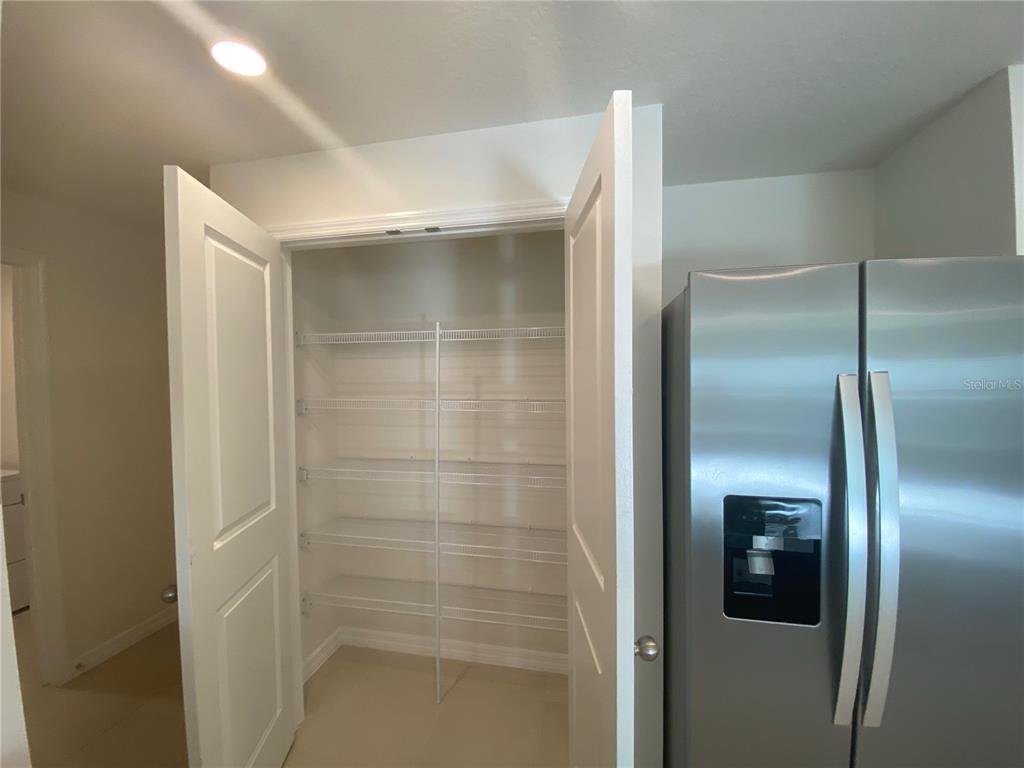 308 Hickory Course Radiel Ocala, FL 34472 - Photo 6 of 24 a bathroom with a glass shower door